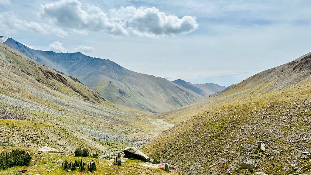 Mountains, clouds, water stream